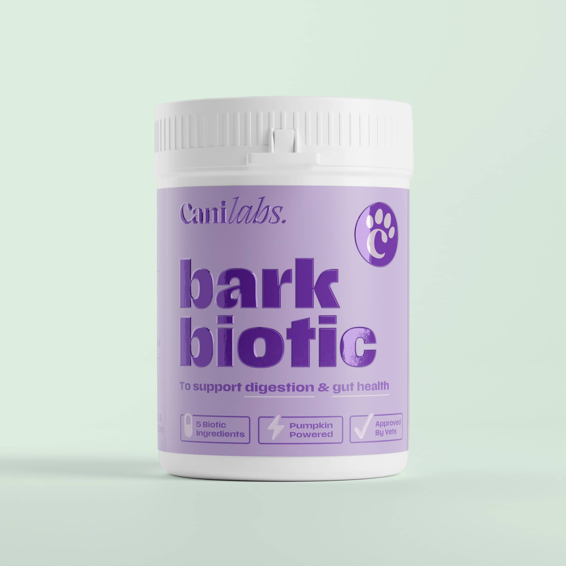 Bark Biotic tub — white lid, lilac label with the Canilabs paw logo, "5 Biotic Ingredients", "Pumpkin Powered" and "Approved By Vets" badges